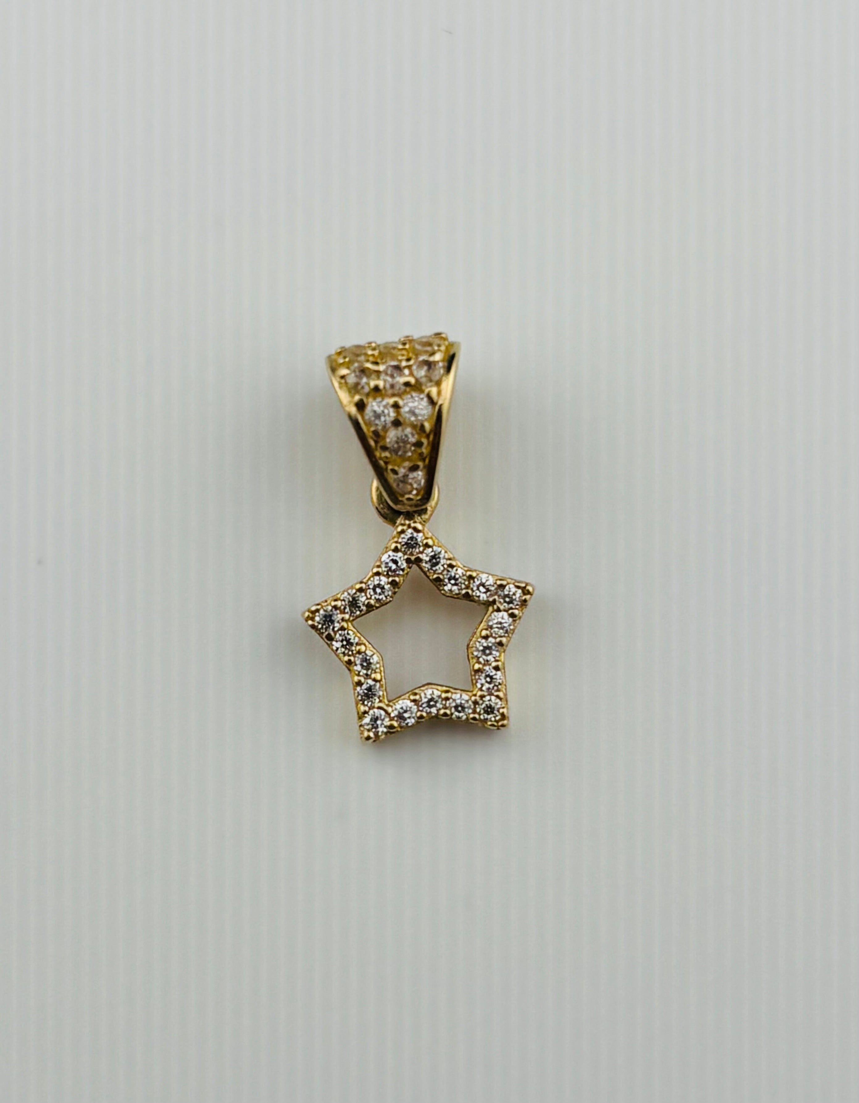 Dije de estrella en oro 10K
